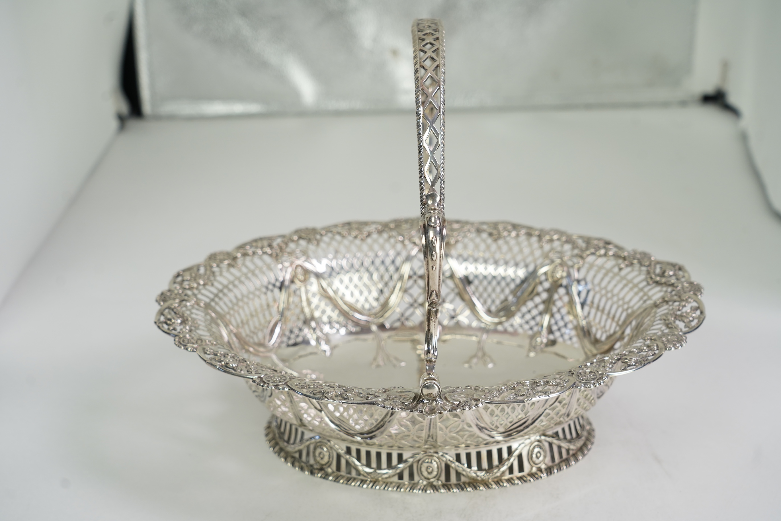 A George III pieced silver oval cake basket, by Charles Aldridge & Henry Green